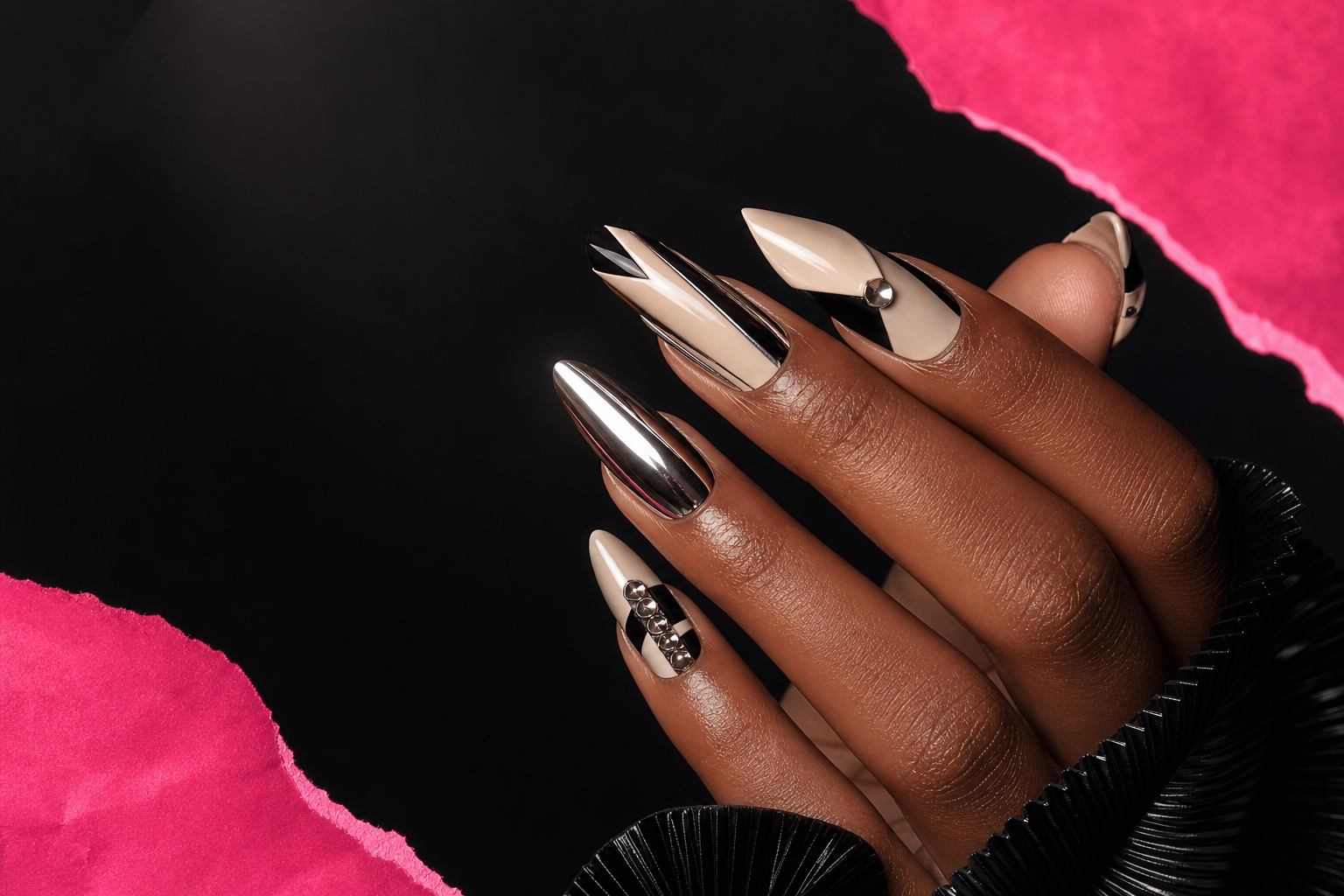 Polished ivory, black and chrome runway-inspired manicure